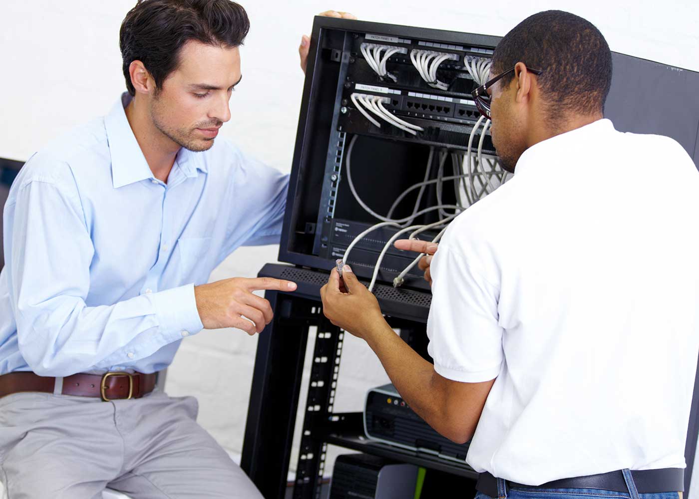 IT Support service - PCMaster Pro Technicians fixing a network
