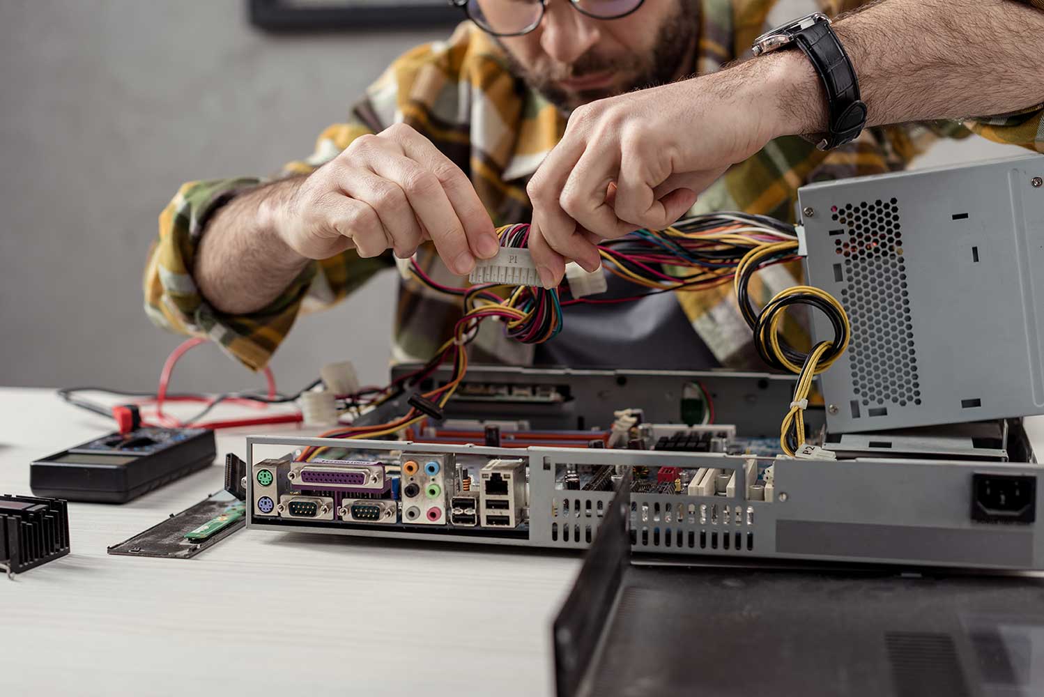 PC Repair - PCMaster Pro Technician repairing PC