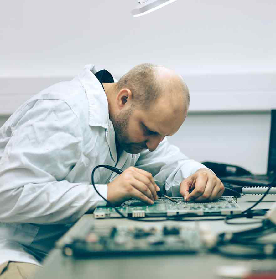 PCMaster Pro Technician repairing laptop